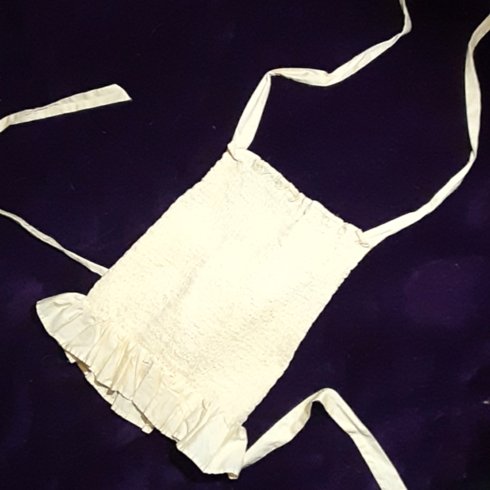 A yellow strapped crop top